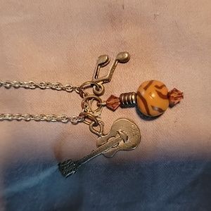 Guitar and musical note necklace